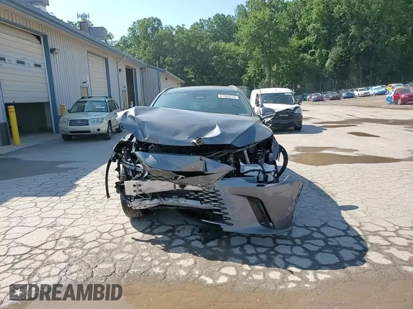 2023 Lexus RX 350h with VIN 2T2BBMCA0PC002776, listed as a Copart auction lot 61464215 with 73,468 mi miles and Salvage title. Bid and sale history available at DreamBid. Image 14.
