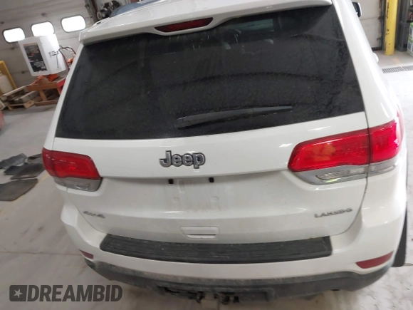 2014 Jeep Grand Cherokee Laredo with VIN 1C4RJFAG4EC309401, listed as a IAAI auction lot 41996233 with 243,541 mi miles and . Bid and sale history available at DreamBid. Image 16.