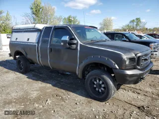 1999 Ford Super Duty F-250 XL with VIN 1FTNX21L5XEA67499, listed as a Copart auction lot 50822095 with 480,067 mi miles and Salvage Title. Bid and sale history available at carsss.com. Image 4.