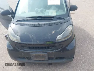 2009 Smart fortwo Pure z VIN WMEEJ31X59K312270, wystawiony jako IAAI lot #41910686 z przebiegiem 111 107 mil mil oraz . Historia ofert i sprzedaży dostępna na DreamBid. Obrazek 6.