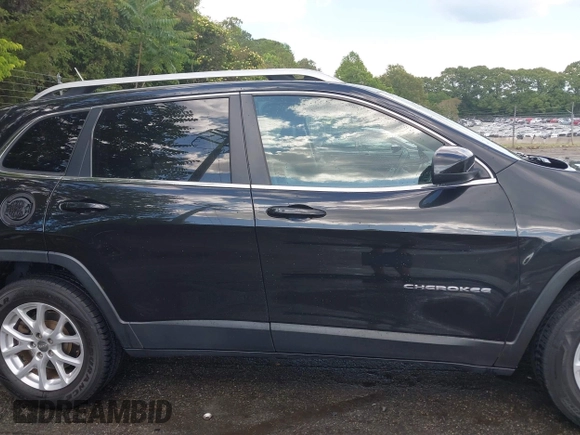 2015 Jeep Cherokee Latitude z VIN 1C4PJMCB4FW648897, wystawiony jako IAAI lot #42182493 z przebiegiem 129 457 mil mil oraz . Historia ofert i sprzedaży dostępna na DreamBid. Obrazek 13.