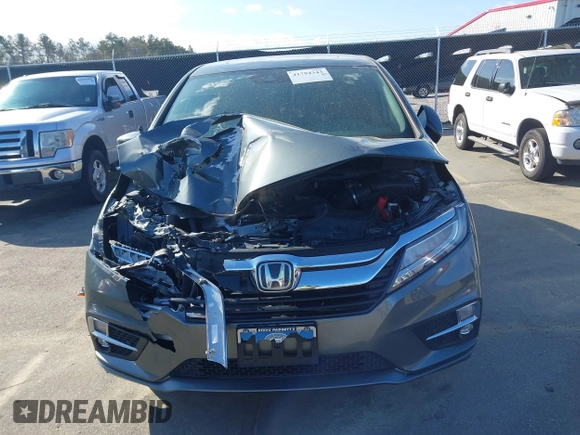 2020 Honda Odyssey Touring z VIN 5FNRL6H8XLB035047, wystawiony jako IAAI lot #41794343 z przebiegiem 57 537 mil mil oraz . Historia ofert i sprzedaży dostępna na DreamBid. Obrazek 12.