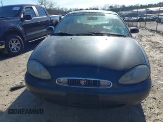 1998 Mercury Sable LS Premium Group z VIN 1MEFM53S0WA638842, wystawiony jako IAAI lot #41557457 z przebiegiem 153 443 mil mil oraz . Historia ofert i sprzedaży dostępna na DreamBid. Obrazek 6.