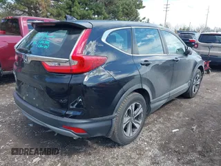 2017 Honda CR-V LX with VIN 7FARW5H38HE010794, listed as a IAAI auction lot 41855303 with 126,992 mi miles. Bid and sale history available at carsss.com. Image 4.