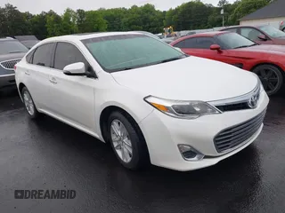 2014 Toyota Avalon Limited z VIN 4T1BK1EB7EU079052, wystawiony jako IAAI lot #42236459 z przebiegiem 82 278 mil mil oraz . Historia ofert i sprzedaży dostępna na DreamBid. Obrazek 1.