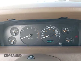 1999 Jeep Grand Cherokee Limited with VIN 1J4GW68N3XC688112, listed as a IAAI auction lot 41640033 with 196,851 mi miles. Bid and sale history available at carsss.com. Image 7.