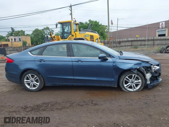 2018 Ford Fusion SE with VIN 3FA6P0HD9JR192927, listed as a IAAI auction lot 42616919 with 90,623 mi miles and . Bid and sale history available at DreamBid. Image 13.