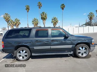 2003 Chevrolet Suburban LS with VIN 3GNEC16T63G115908, listed as a IAAI auction lot 41950165 with 202,075 mi miles. Bid and sale history available at carsss.com. Image 13.