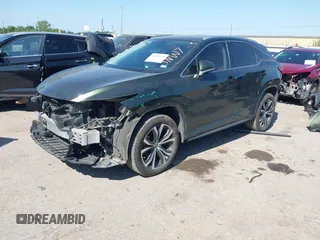 2021 Lexus RX 350 with VIN 2T2HZMAA2MC199129, listed as a IAAI auction lot 41990653 with 60,574 mi miles and . Bid and sale history available at DreamBid. Image 2.