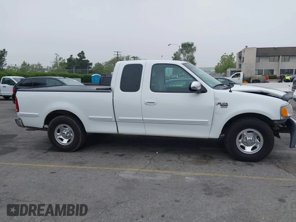 2000 Ford F-150 XL with VIN 1FTRX17L4YNA39407, listed as a IAAI auction lot 42141350 with 82,824 mi miles and . Bid and sale history available at DreamBid. Image 13.