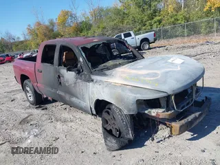 2009 Dodge Dakota SXT with VIN 1D7HE38K59S719263, listed as a IAAI auction lot 40661314 with Not Provided miles and . Bid and sale history available at carsss.com. Image 1.
