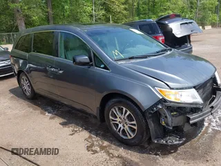 2012 Honda Odyssey EX-L with VIN 5FNRL5H67CB041252, listed as a IAAI auction lot 42158494 with 152,940 mi miles and . Bid and sale history available at DreamBid. Image 1.