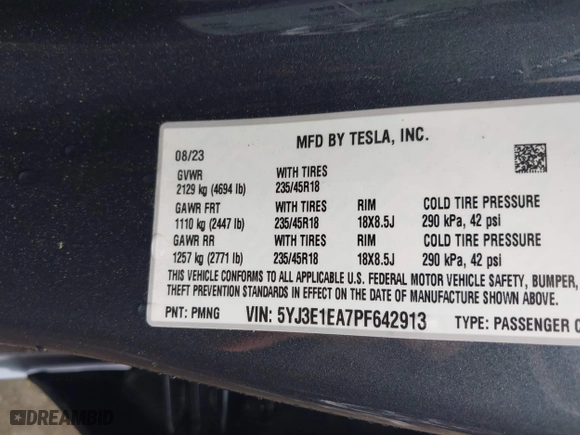 2023 Tesla Model 3 with VIN 5YJ3E1EA7PF642913, listed as a IAAI auction lot 41898249 with 26,394 mi miles. Bid and sale history available at carsss.com. Image 9.