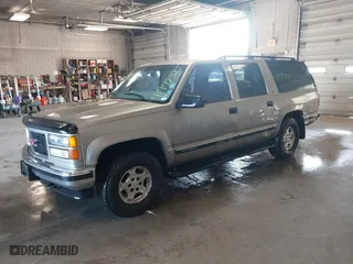 1999 GMC Suburban with VIN 3GKFK16R7XG549530, listed as a IAAI auction lot 41778323 with 174,866 mi miles. Bid and sale history available at carsss.com. Image 2.
