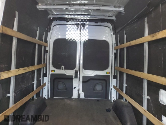 2021 Ford Transit Cargo с VIN 1FTBR1X80MKA26754, выставлен на аукционе Copart как лот 57982185 с пробегом 80 537 миль миль и Списание • Salvage title. История ставок и продаж доступна на DreamBid. Изображение 10.