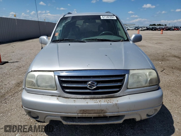 2002 Suzuki XL7 Standard z VIN JS3TX92V224107201, wystawiony jako Copart lot #61142394 z przebiegiem Nie podano mil oraz Szkoda całkowita • Salvage title. Historia ofert i sprzedaży dostępna na DreamBid. Obrazek 5.