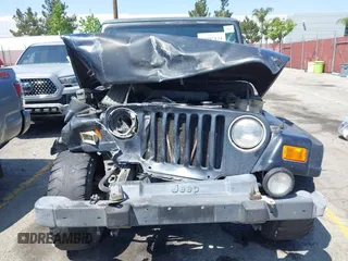 2001 Jeep Wrangler Sahara with VIN 1J4FA59SX1P337951, listed as a IAAI auction lot 42087134 with 154,479 mi miles and . Bid and sale history available at carsss.com. Image 12.