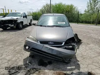 2007 Ford Focus S z VIN 1FAHP34N17W103625, wystawiony jako Copart lot #55300395 z przebiegiem 82 041 mil mil oraz Szkoda całkowita • Salvage title. Historia ofert i sprzedaży dostępna na DreamBid. Obrazek 13.