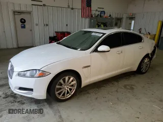 2015 Jaguar XF I4 T Premium with VIN SAJWA0FS3FPU67494, listed as a Copart auction lot 83887334 with 112,379 mi miles and Salvage Title. Bid and sale history available at carsss.com. Image 1.
