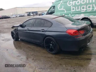 2015 BMW M6 z VIN WBS6C9C5XFD467854, wystawiony jako Copart lot #86177724 z przebiegiem 55 789 mil mil oraz Szkoda całkowita • Salvage title. Historia ofert i sprzedaży dostępna na DreamBid. Obrazek 2.