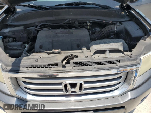 2012 Honda Ridgeline RTL z VIN 5FPYK1F54CB451175, wystawiony jako Copart lot #59536285 z przebiegiem 160 476 mil mil oraz Szkoda całkowita • Salvage title. Historia ofert i sprzedaży dostępna na DreamBid. Obrazek 11.