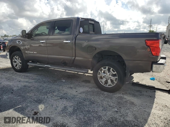 2016 Nissan Titan XD Platinum Reserve with VIN 1N6BA1F20GN500500, listed as a Copart auction lot 75396354 with 164,966 mi miles and Salvage Title. Bid and sale history available at carsss.com. Image 2.