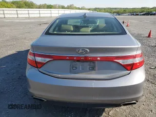 2015 Hyundai Azera z VIN KMHFG4JGXFA483472, wystawiony jako Copart lot #52216745 z przebiegiem 130 758 mil mil oraz Szkoda całkowita • Salvage title. Historia ofert i sprzedaży dostępna na DreamBid. Obrazek 6.