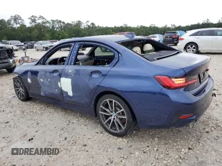 2020 BMW 3 Series 330i with VIN 3MW5R1J04L8B43542, listed as a Copart auction lot 52710145 with 58,597 mi miles and Clean title. Bid and sale history available at DreamBid. Image 2.