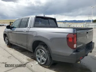 2023 Honda Ridgeline RTL-E with VIN 5FPYK3F78PB010961, listed as a Copart auction lot 51458635 with 33,508 mi miles and Salvage title. Bid and sale history available at DreamBid. Image 2.
