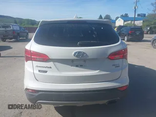 2016 Hyundai Santa Fe z VIN 5XYZTDLB7GG329320, wystawiony jako IAAI lot #42145591 z przebiegiem 106 345 mil mil oraz . Historia ofert i sprzedaży dostępna na DreamBid. Obrazek 16.