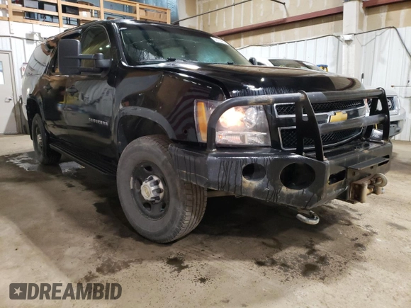 2013 Chevrolet Suburban with VIN 1GNWK5EG4DR246825, listed as a Copart auction lot 56764205 with 162,459 mi miles and Salvage title. Bid and sale history available at DreamBid. Image 4.