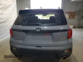 2023 Honda Passport Elite with VIN 5FNYF8H03PB034613, listed as a Copart auction lot 54009215 with 102,841 mi miles and Salvage title. Bid and sale history available at DreamBid. Image 6.