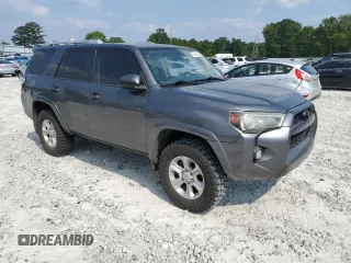 2014 Toyota 4Runner SR5 with VIN JTEZU5JR1E5075253, listed as a Copart auction lot 59514905 with 167,351 mi miles and Salvage title. Bid and sale history available at DreamBid. Image 4.