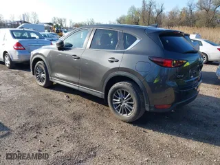 2020 Mazda CX-5 Touring with VIN JM3KFACM2L0786598, listed as a IAAI auction lot 41933368 with 93,657 mi miles. Bid and sale history available at carsss.com. Image 3.