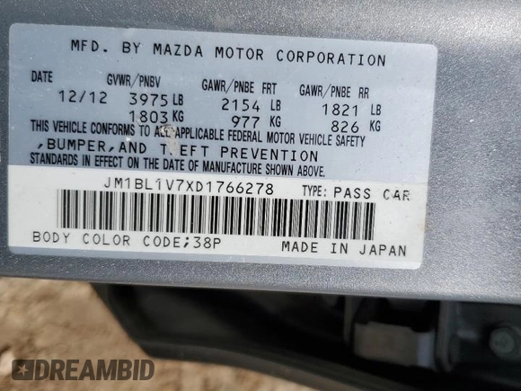 2013 Mazda 3 i Touring z VIN JM1BL1V7XD1766278, wystawiony jako Copart lot #60024815 z przebiegiem 143 490 mil mil oraz Szkoda całkowita • Salvage title. Historia ofert i sprzedaży dostępna na DreamBid. Obrazek 13.