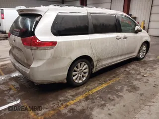 2011 Toyota Sienna XLE with VIN 5TDDK3DC0BS005250, listed as a IAAI auction lot 41526861 with 145,466 mi miles. Bid and sale history available at carsss.com. Image 4.