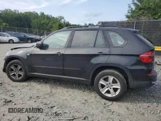 2012 BMW X5 35i with VIN 5UXZV4C5XCL761370, listed as a Copart auction lot 59436845 with 124,722 mi miles and Salvage title. Bid and sale history available at DreamBid. Image 2.