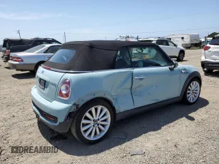 2013 MINI Convertible S z VIN WMWZP3C54DT551321, wystawiony jako Copart lot #57089205 z przebiegiem 92 441 mil mil oraz Szkoda całkowita • Salvage title. Historia ofert i sprzedaży dostępna na DreamBid. Obrazek 3.