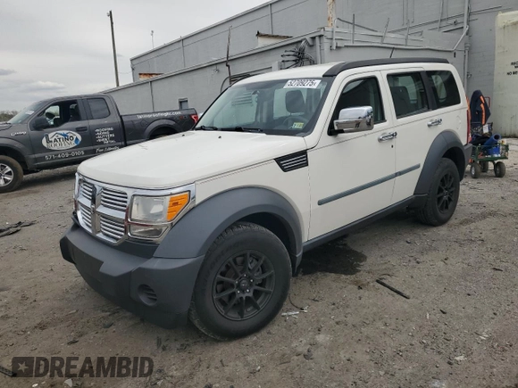 2008 Dodge Nitro SXT with VIN 1D8GU28K08W285099, listed as a Copart auction lot 52709275 with 123,048 mi miles and Salvage Title. Bid and sale history available at DreamBid. Image 1.
