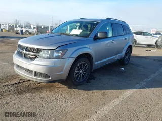 2017 Dodge Journey SE with VIN 3C4PDCAB5HT708246, listed as a IAAI auction lot 41613104 with 128,067 mi miles. Bid and sale history available at carsss.com. Image 17.