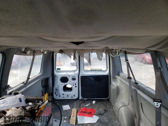 2002 Ford Econoline Passenger XL с VIN 1FMRE11272HB81824, выставлен на аукционе Copart как лот 89143725 с пробегом 376 224 миль миль и Чистый • Clean title. История ставок и продаж доступна на DreamBid. Изображение 10.