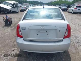 2008 Hyundai Accent GLS z VIN KMHCN46CX8U191823, wystawiony jako IAAI lot #42270245 z przebiegiem 242 852 mil mil oraz . Historia ofert i sprzedaży dostępna na DreamBid. Obrazek 15.