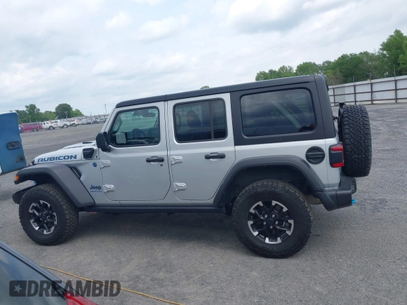 2024 Jeep Wrangler Rubicon with VIN 1C4RJXR61RW224506, listed as a IAAI auction lot 42111434 with 33,689 mi miles and . Bid and sale history available at DreamBid. Image 14.