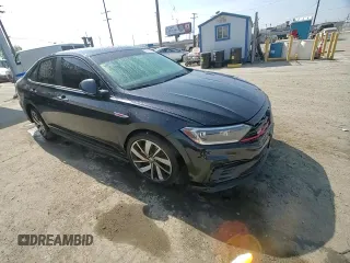 2019 Volkswagen Jetta GLI S z VIN 3VW6T7BU7KM222882, wystawiony jako Copart lot #53973425 z przebiegiem 59 698 mil mil oraz Szkoda całkowita • Salvage title. Historia ofert i sprzedaży dostępna na DreamBid. Obrazek 13.