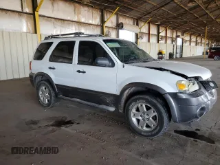 2006 Ford Escape XLT with VIN 1FMYU03166KA73605, listed as a Copart auction lot 71968524 with 143,742 mi miles and Salvage Title. Bid and sale history available at carsss.com. Image 4.