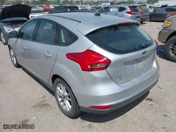 2016 Ford Focus SE with VIN 1FADP3K29GL269691, listed as a IAAI auction lot 42061051 with 100,692 mi miles. Bid and sale history available at carsss.com. Image 3.