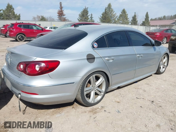 2010 Volkswagen CC Sport with VIN WVWMN7AN2AE566283, listed as a IAAI auction lot 41816386 with 188,376 mi miles. Bid and sale history available at carsss.com. Image 4.