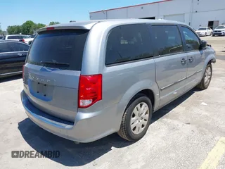 2016 Dodge Grand Caravan SE with VIN 2C4RDGBG9GR385847, listed as a IAAI auction lot 42042755 with 32,613 mi miles and . Bid and sale history available at DreamBid. Image 4.