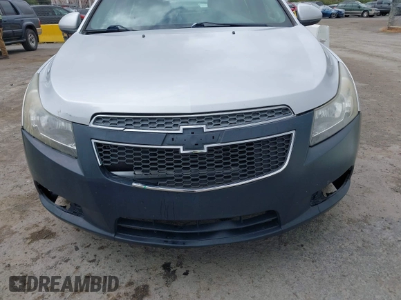 2012 Chevrolet Cruze LT w/2LT with VIN 1G1PG5SC4C7284915, listed as a IAAI auction lot 42064590 with 143,418 mi miles. Bid and sale history available at carsss.com. Image 6.