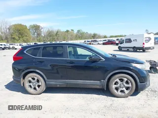 2018 Honda CR-V EX with VIN 7FARW1H57JE042281, listed as a IAAI auction lot 41897670 with 87,319 mi miles. Bid and sale history available at carsss.com. Image 13.